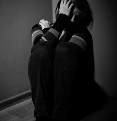 depositphotos_19884131-stock-photo-sad-woman-sitting-alone-in